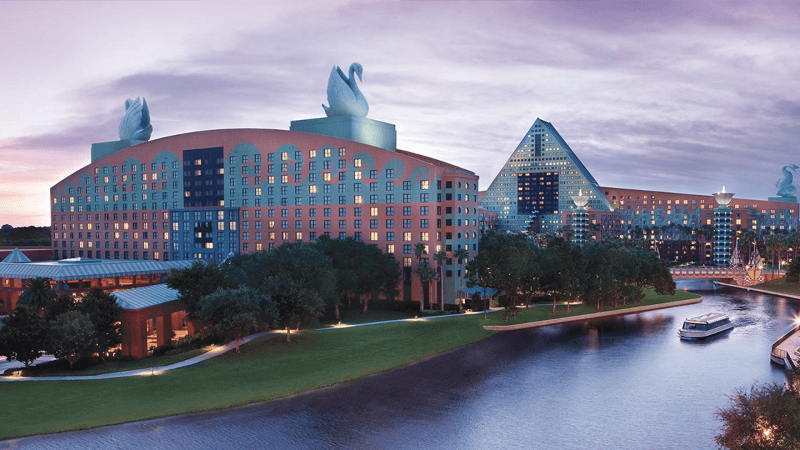 Waterfront resort buildings at Walt Disney World Resort at dusk