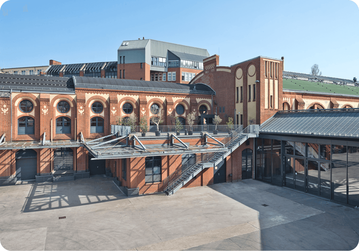 Brick railway-depot buildings and courtyard at STATION Berlin